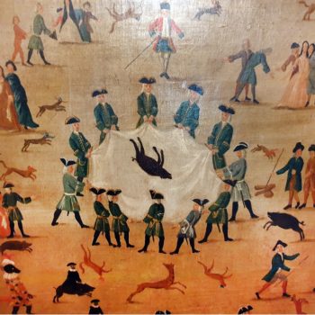 Several figures are engaged in entertainment or play on a large yellow-orange ground. They are painted like figurines from a distance, several in a circle at the centre throwing a black animal in the air via a white cloth they are each holding at the edges. Around the sides, humans in military and formal historical dress stand as dogs dance and leap about.